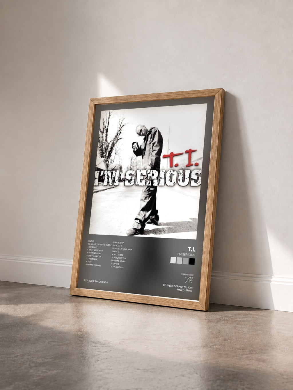 #bois Tableau de l'album I'm Serious de T.I. vu de trois quarts, cadre en bois brut