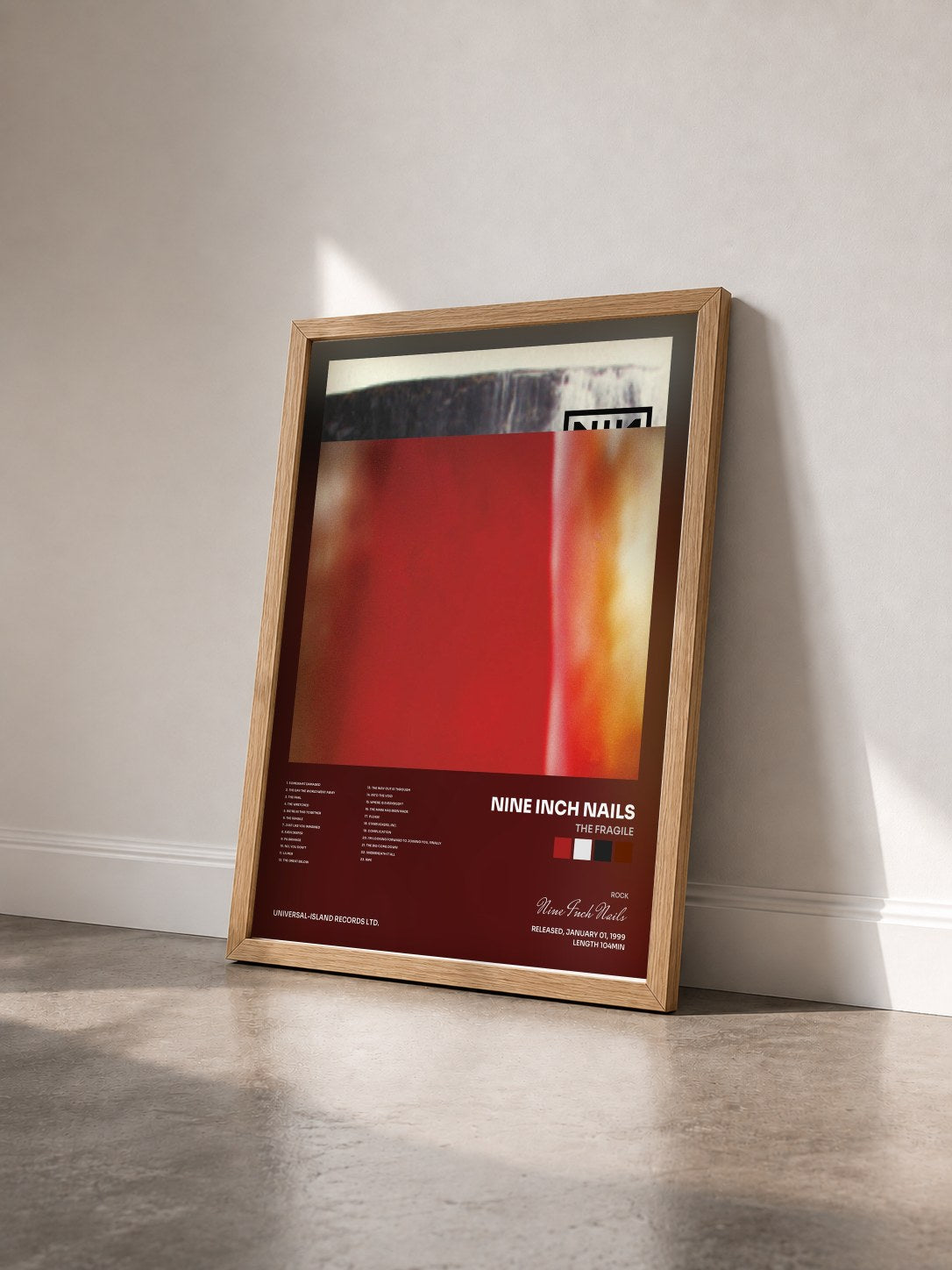 #bois Tableau de l'album The Fragile de Nine Inch Nails vu de trois quarts, cadre en bois brut