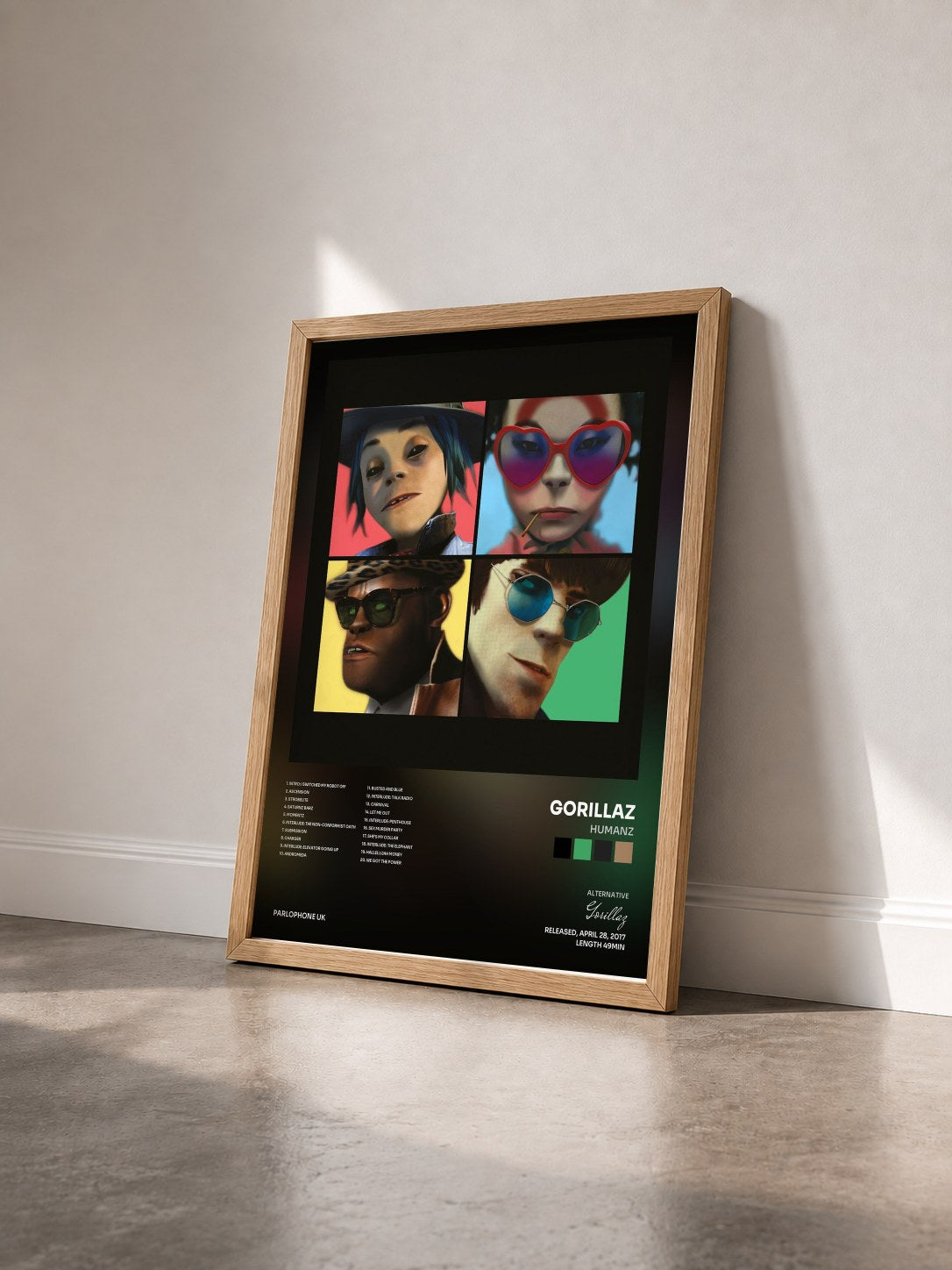 #bois Tableau de l'album Humanz de Gorillaz vu de trois quarts, cadre en bois brut
