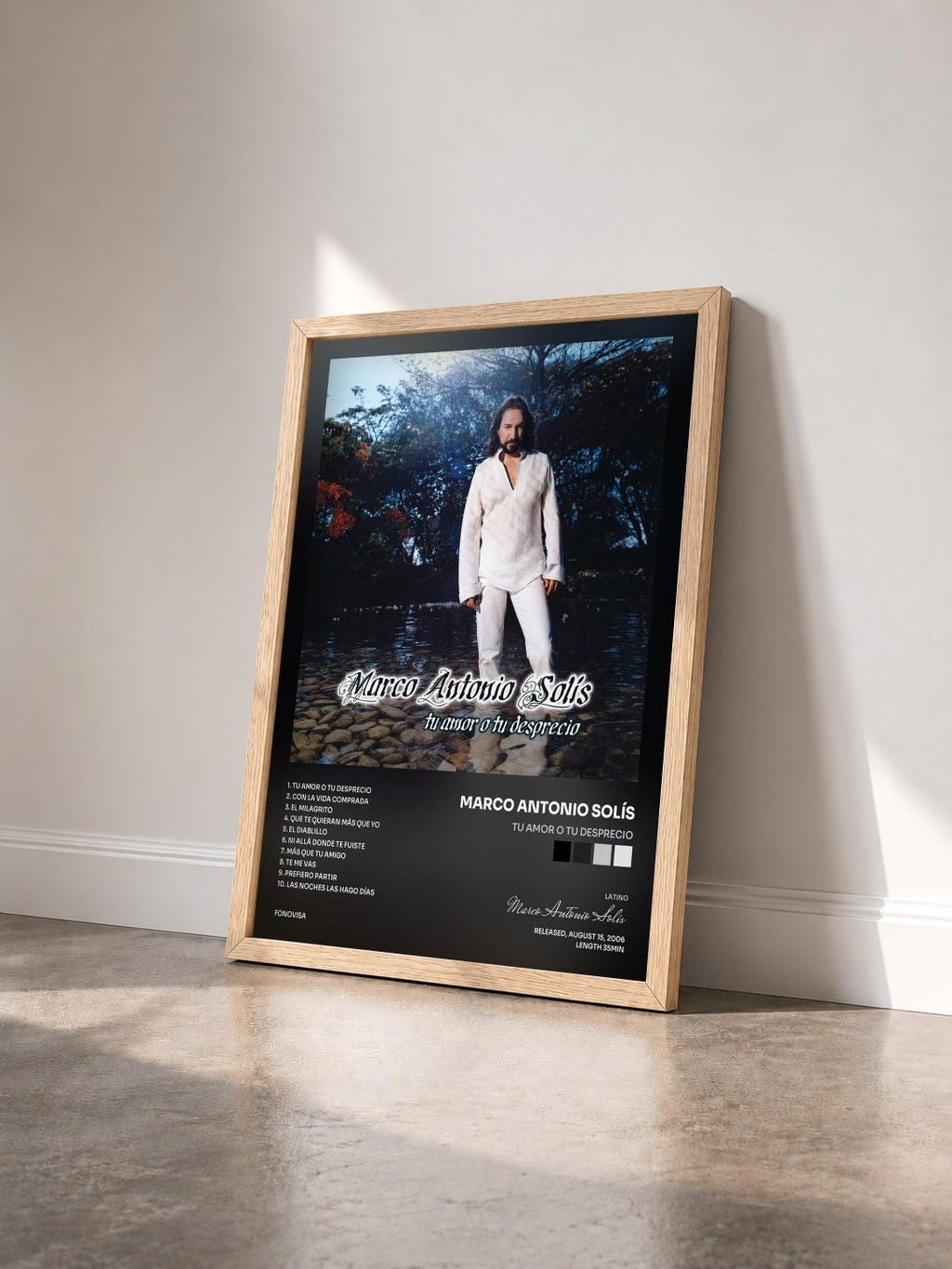 #bois Tableau de l'album Tu Amor O Tu Desprecio de Marco Antonio Solís vu de trois quarts, cadre en bois brut