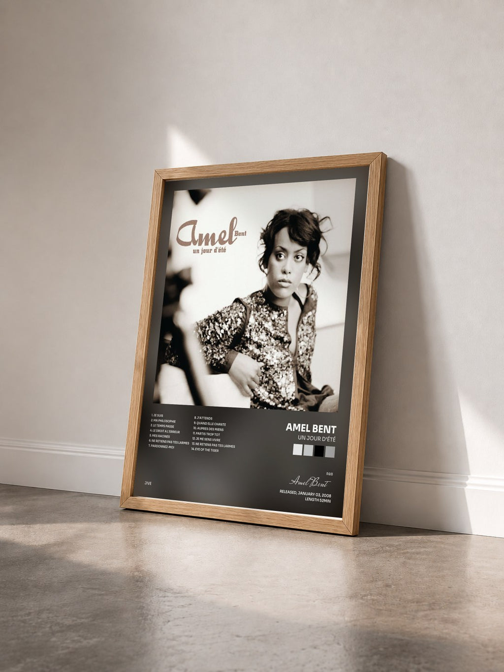 #bois Tableau de l'album Un Jour D'été de Amel Bent vu de trois quarts, cadre en bois brut