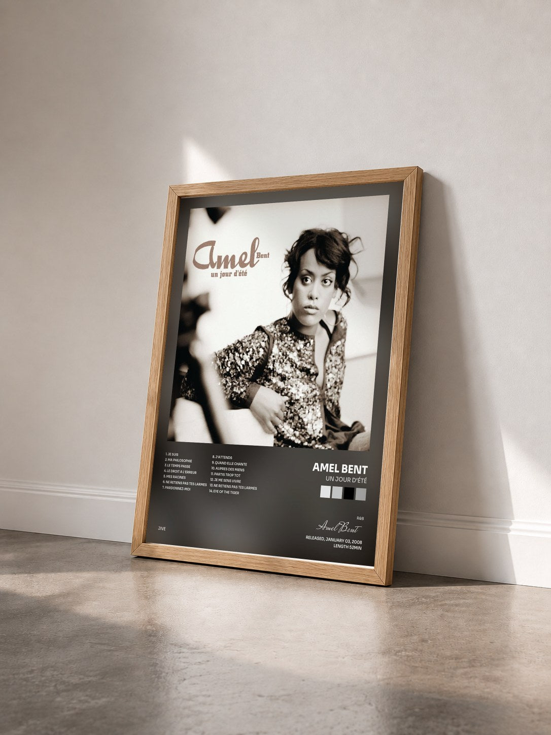 #bois Tableau de l'album Un Jour D'été de Amel Bent vu de trois quarts, cadre en bois brut