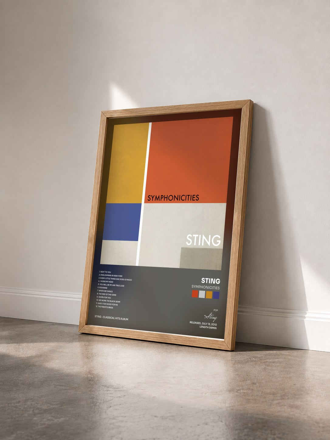 #bois Tableau de l'album Symphonicities de Sting vu de trois quarts, cadre en bois brut