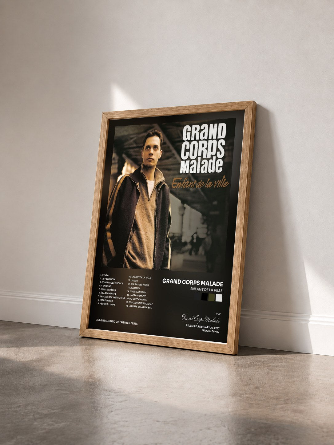 #bois Tableau de l'album Enfant de la ville de Grand Corps Malade vu de trois quarts, cadre en bois brut