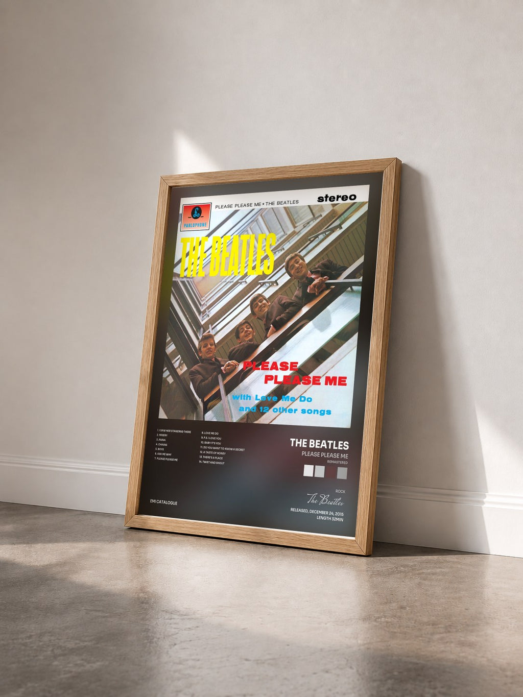 #bois Tableau de l'album Please Please Me (Remastered) de The Beatles vu de trois quarts, cadre en bois brut