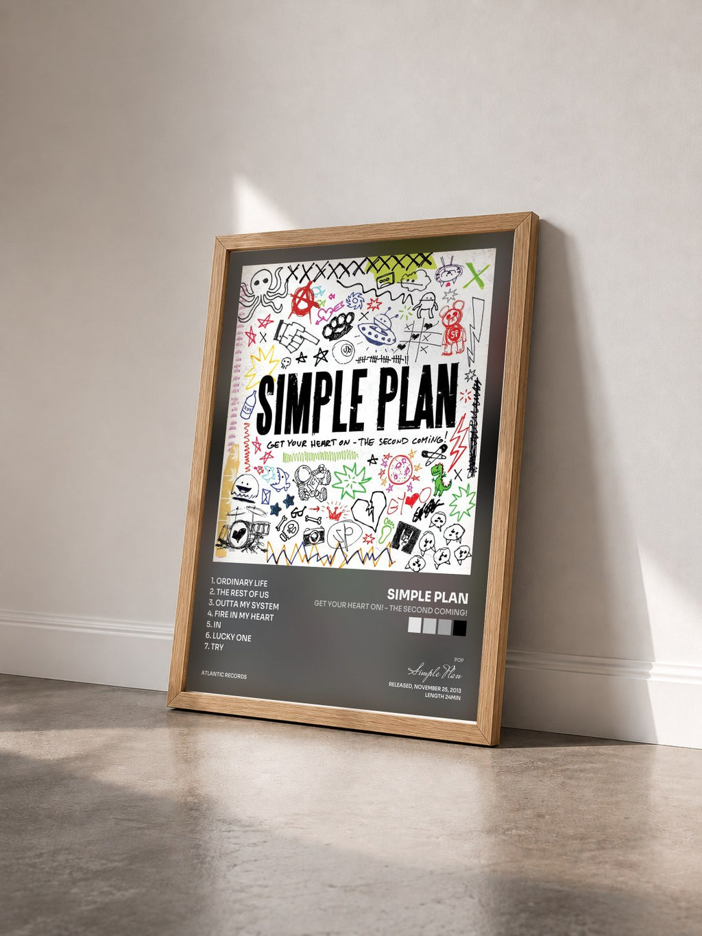 #bois Tableau de l'album Get Your Heart On! - the Second Coming! de Simple Plan vu de trois quarts, cadre en bois brut
