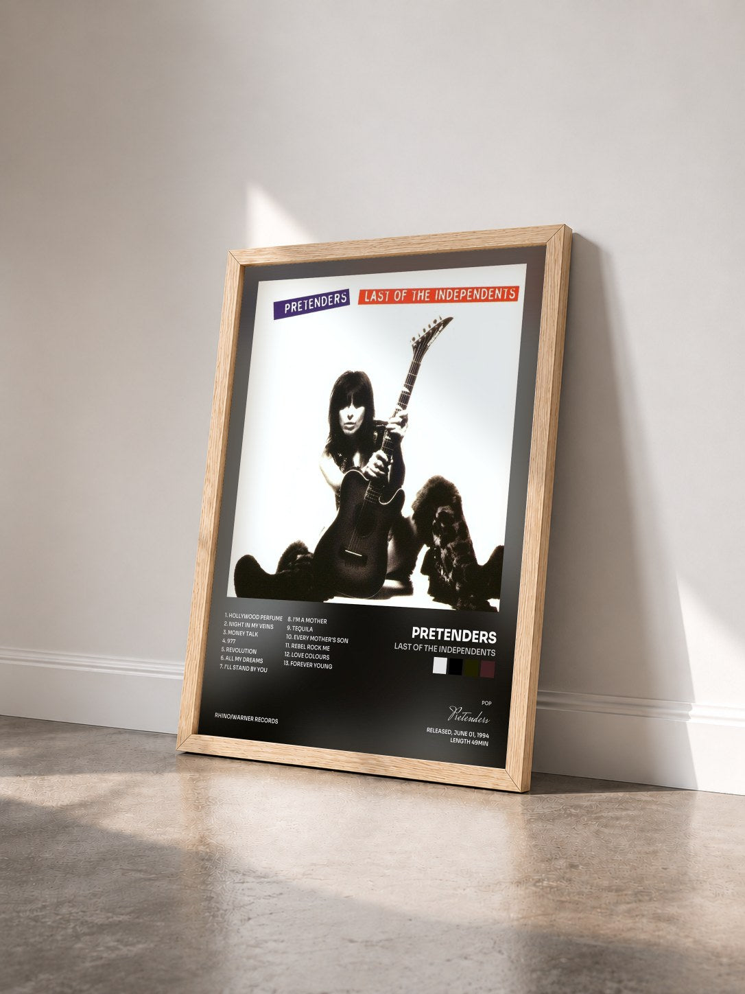 #bois Tableau de l'album Last of the Independents de Pretenders vu de trois quarts, cadre en bois brut