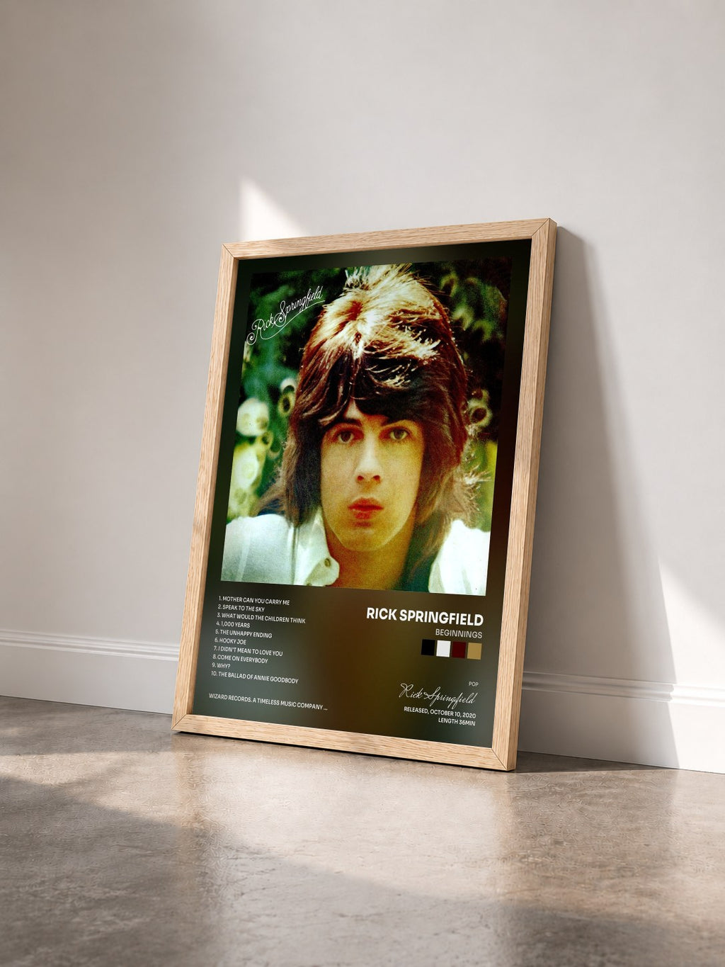 #bois Tableau de l'album Beginnings de Rick Springfield vu de trois quarts, cadre en bois brut