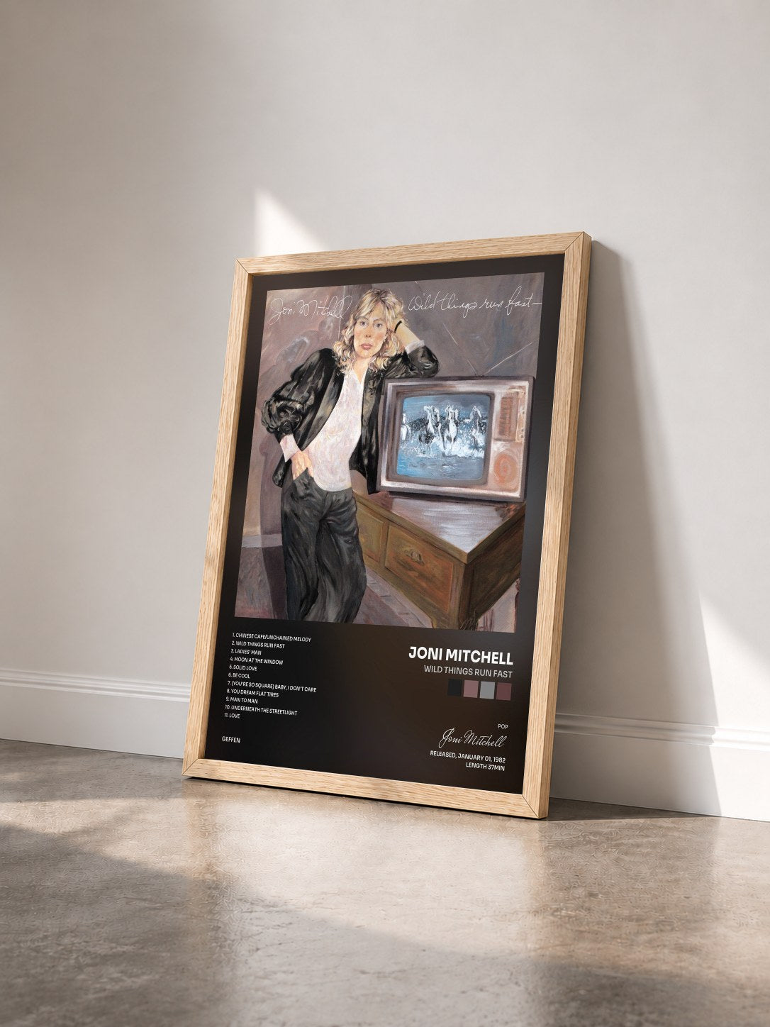 #bois Tableau de l'album Wild Things Run Fast de Joni Mitchell vu de trois quarts, cadre en bois brut