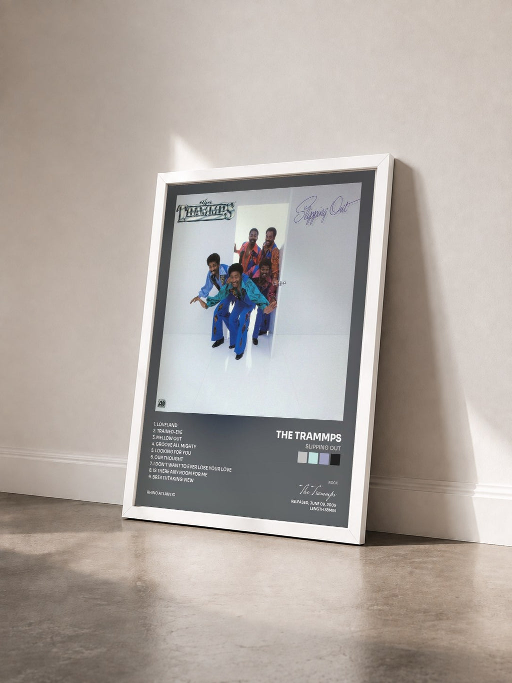 #blanc Tableau de l'album Slipping Out de The Trammps vu de trois quarts, cadre blanc