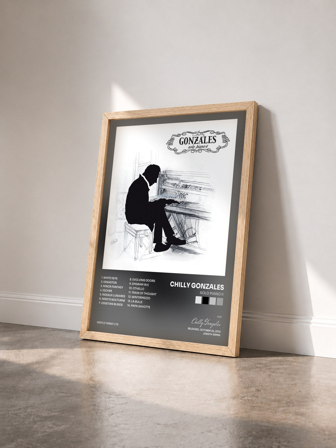 #bois Tableau de l'album Solo Piano II de Chilly Gonzales vu de trois quarts, cadre en bois brut