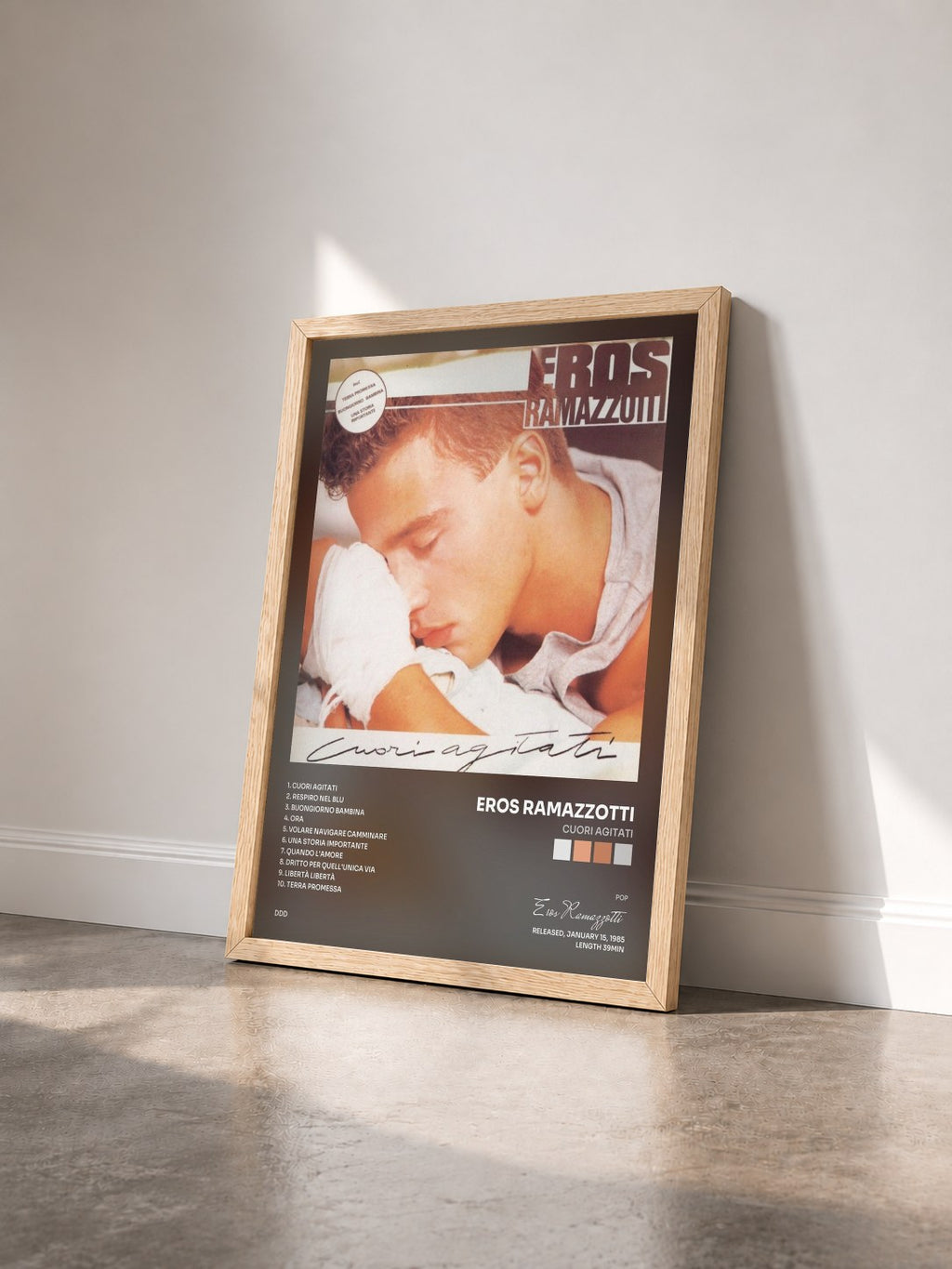#bois Tableau de l'album Cuori agitati de Eros Ramazzotti vu de trois quarts, cadre en bois brut