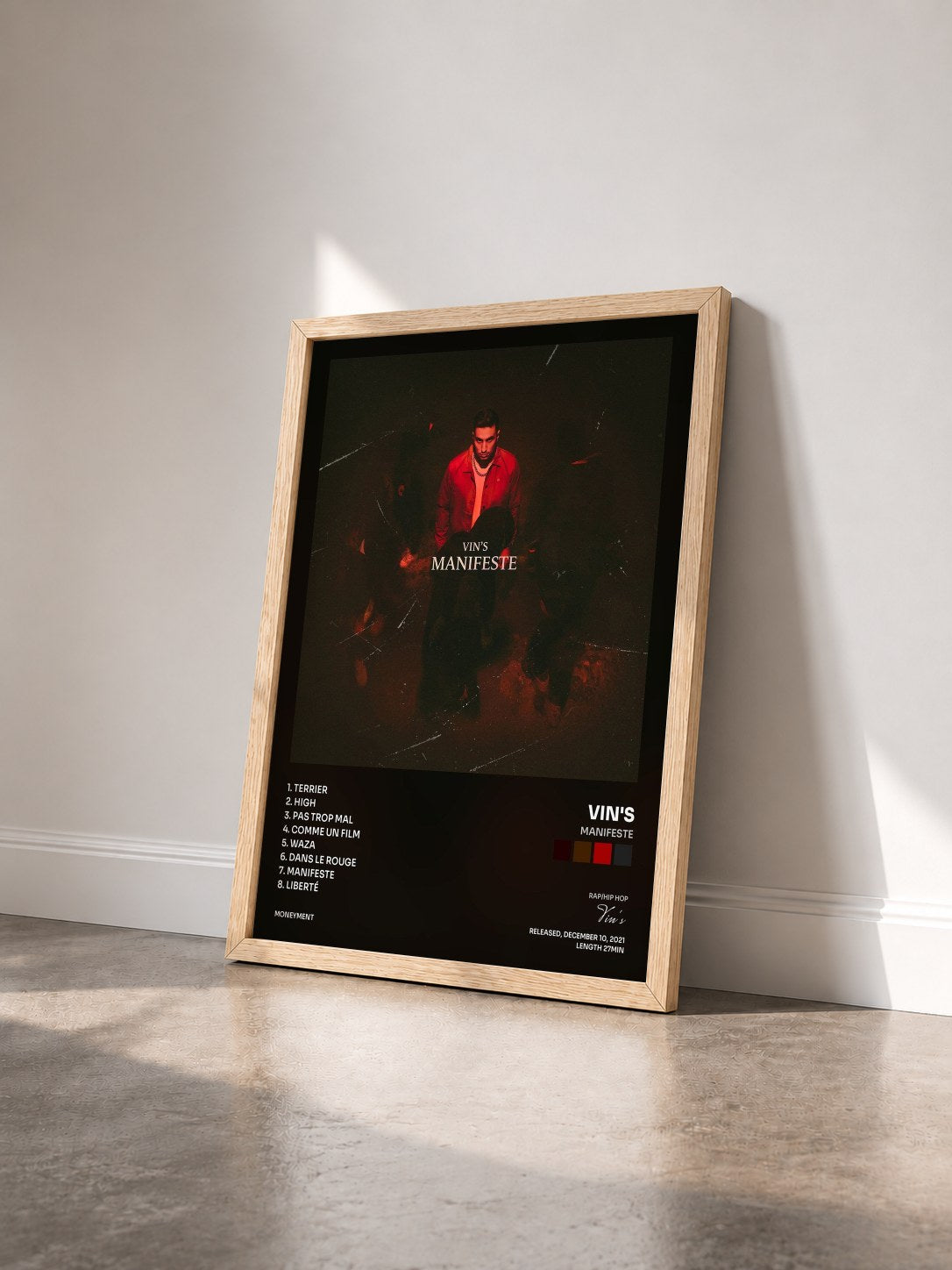 #bois Tableau de l'album Manifeste de Vin's vu de trois quarts, cadre en bois brut