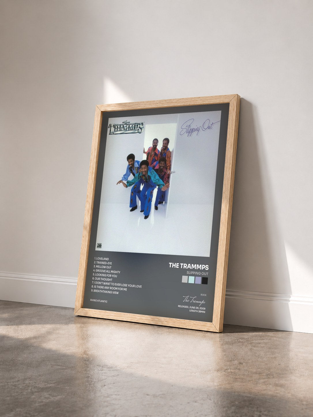 #bois Tableau de l'album Slipping Out de The Trammps vu de trois quarts, cadre en bois brut