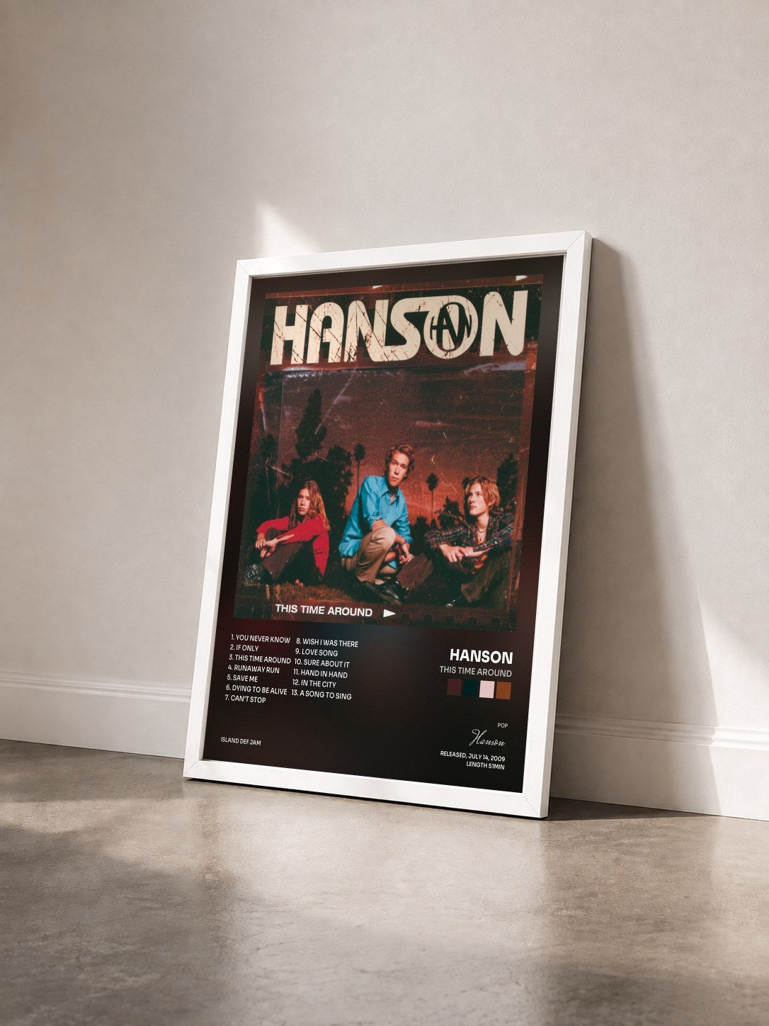 #blanc Tableau de l'album This Time Around de Hanson vu de trois quarts, cadre blanc
