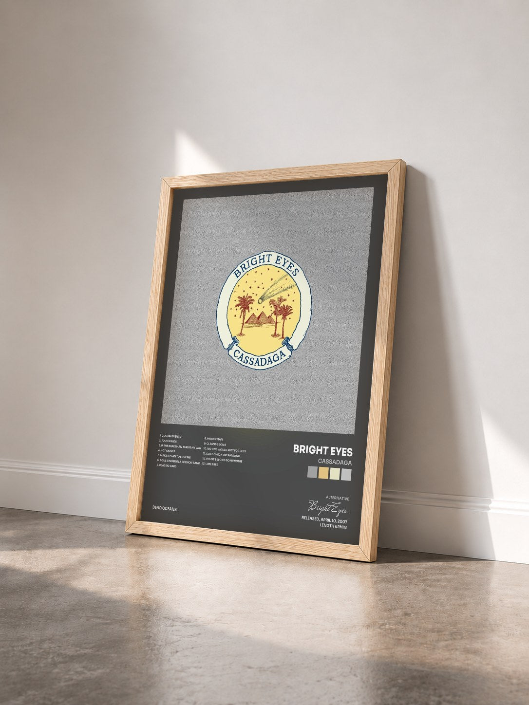 #bois Tableau de l'album Cassadaga de Bright Eyes vu de trois quarts, cadre en bois brut