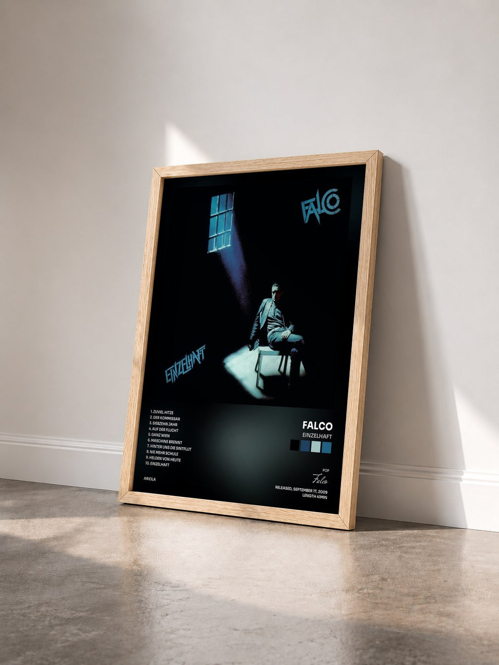#bois Tableau de l'album Einzelhaft de Falco vu de trois quarts, cadre en bois brut