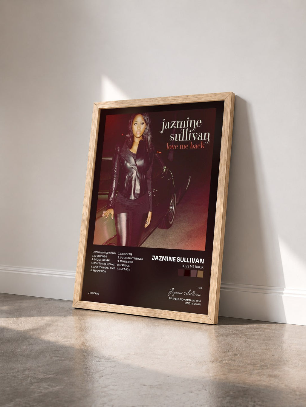 #bois Tableau de l'album Love Me Back de Jazmine Sullivan vu de trois quarts, cadre en bois brut