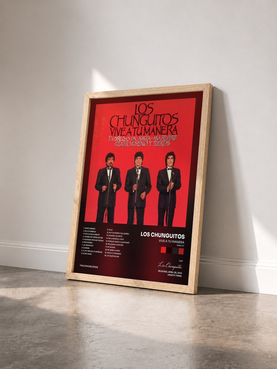 #bois Tableau de l'album Vive A Tu Manera (Directo) de Los Chunguitos vu de trois quarts, cadre en bois brut