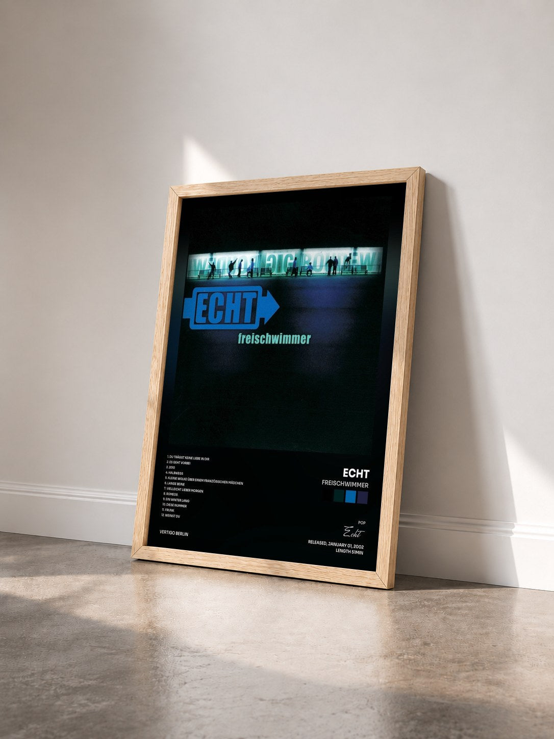 #bois Tableau de l'album Freischwimmer de Echt vu de trois quarts, cadre en bois brut
