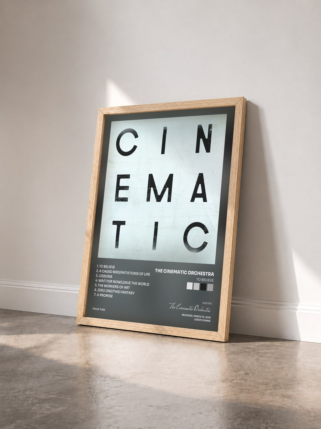 #bois Tableau de l'album To Believe de The Cinematic Orchestra vu de trois quarts, cadre en bois brut