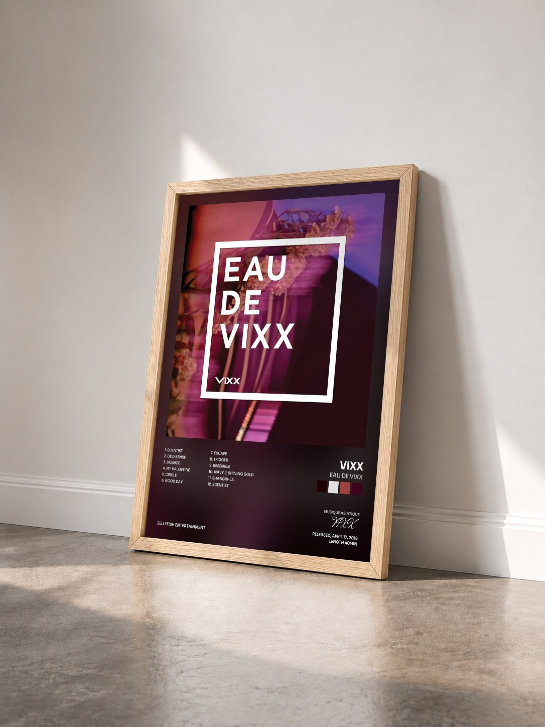 #bois Tableau de l'album EAU DE VIXX de VIXX vu de trois quarts, cadre en bois brut