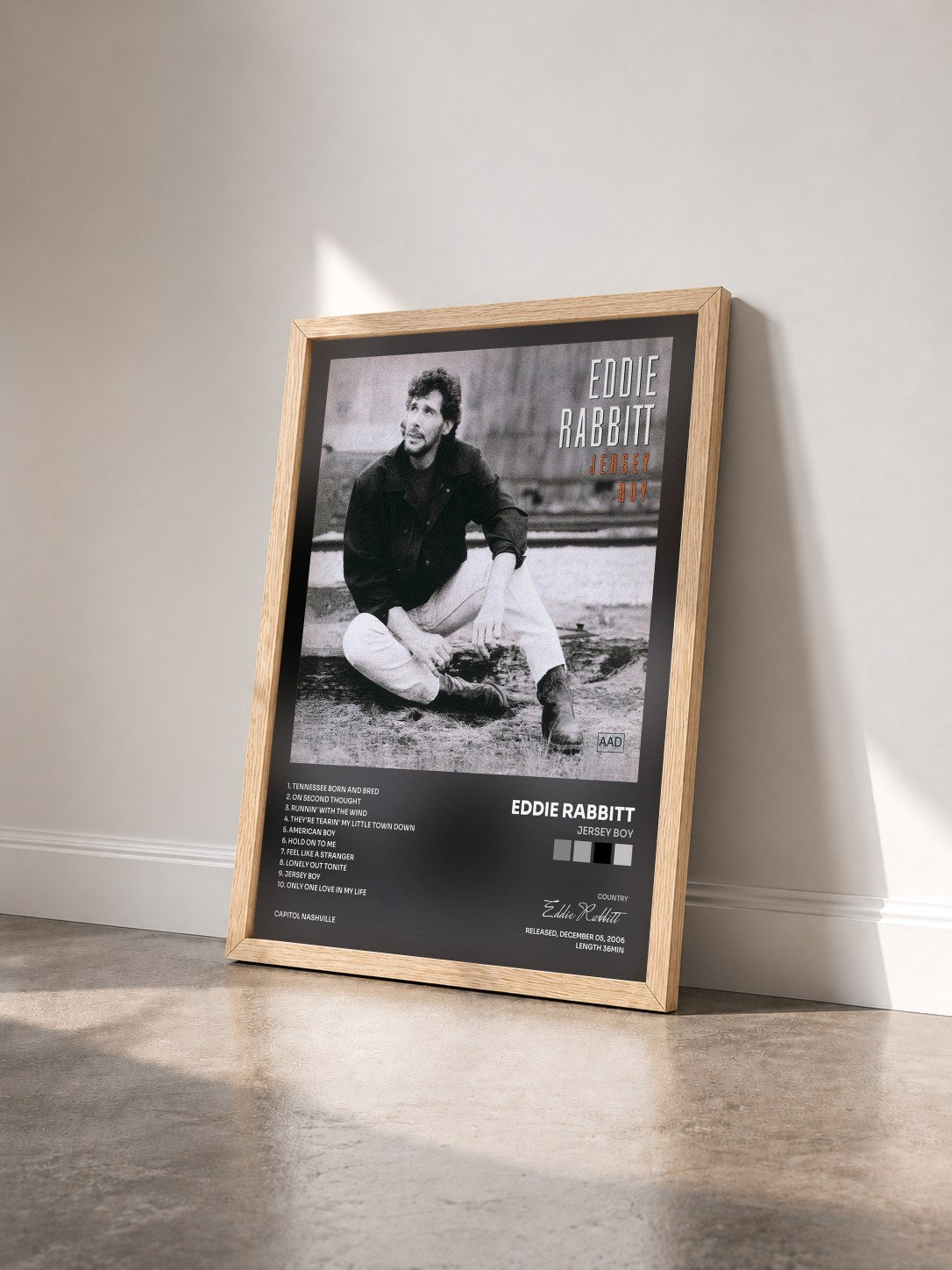 #bois Tableau de l'album Jersey Boy de Eddie Rabbitt vu de trois quarts, cadre en bois brut