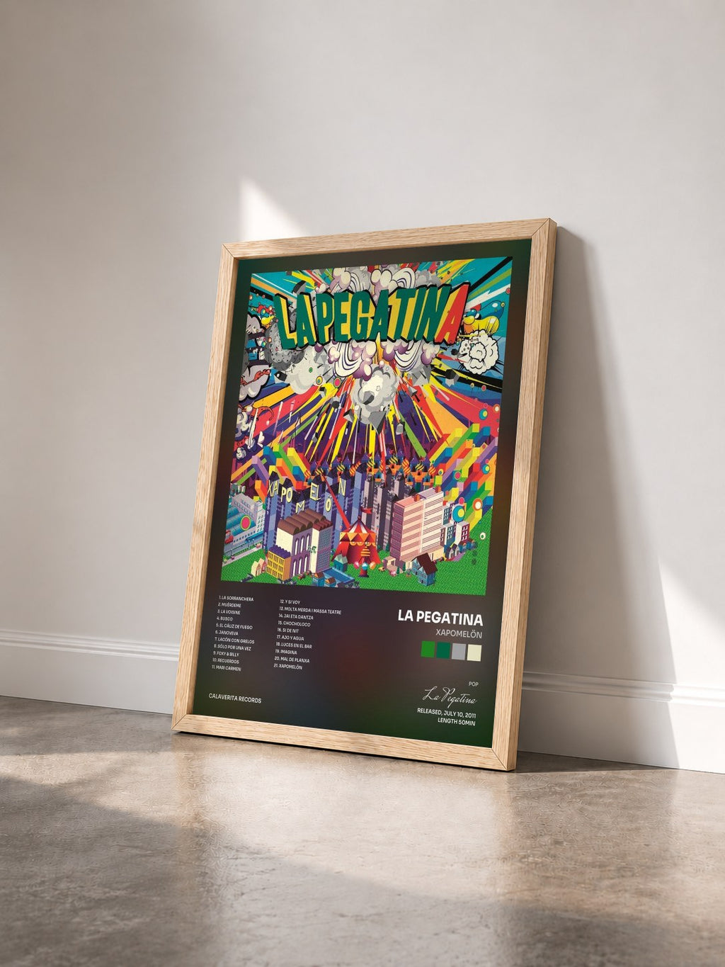 #bois Tableau de l'album Xapomelön de La Pegatina vu de trois quarts, cadre en bois brut