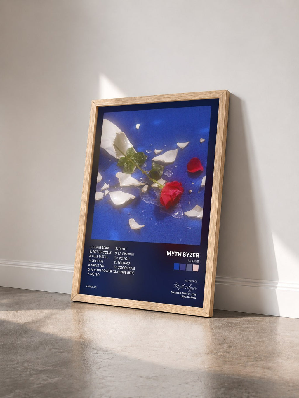 #bois Tableau de l'album Bisous de Myth Syzer vu de trois quarts, cadre en bois brut