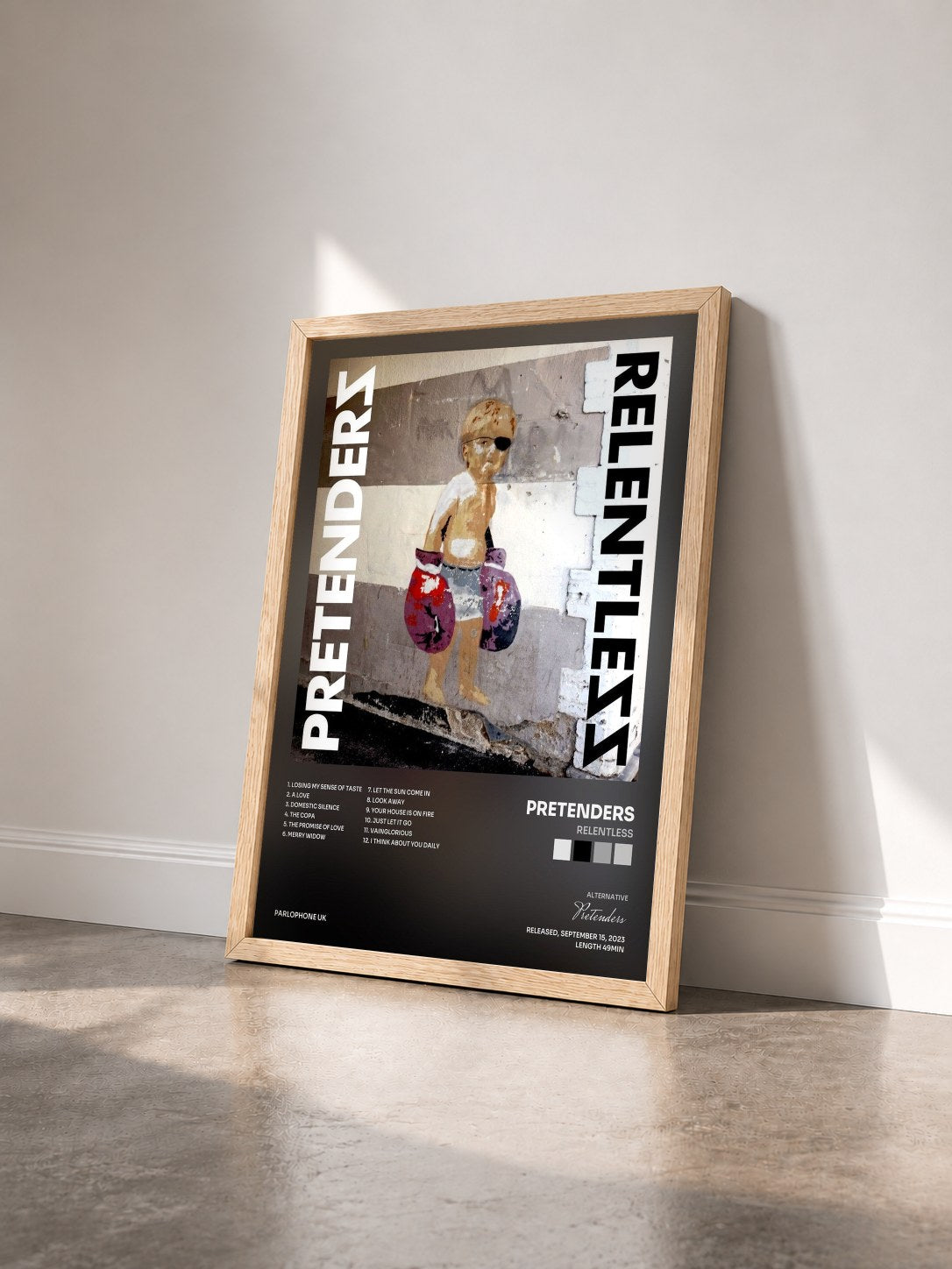 #bois Tableau de l'album Relentless de Pretenders vu de trois quarts, cadre en bois brut