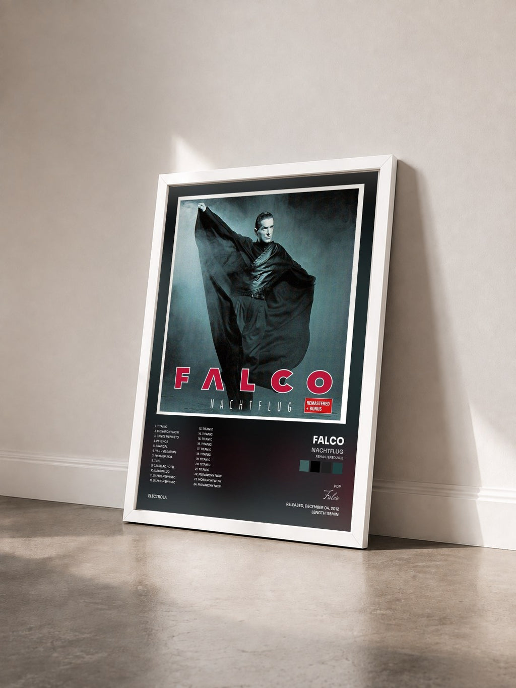 #blanc Tableau de l'album Nachtflug (Remastered 2012) de Falco vu de trois quarts, cadre blanc