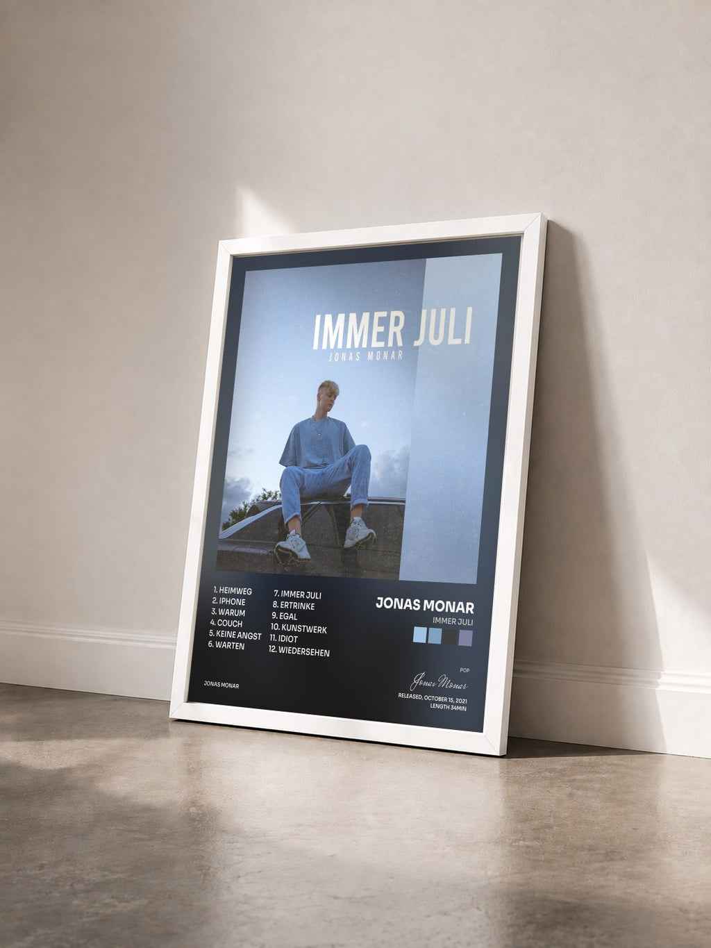 #blanc Tableau de l'album Immer Juli de Jonas Monar vu de trois quarts, cadre blanc