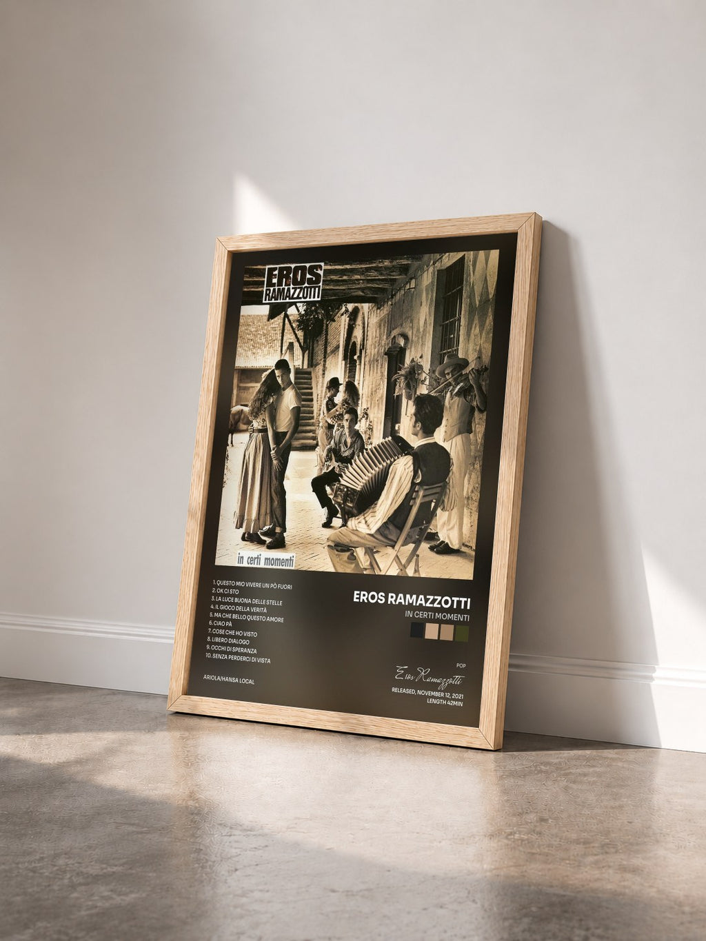 #bois Tableau de l'album In certi momenti de Eros Ramazzotti vu de trois quarts, cadre en bois brut
