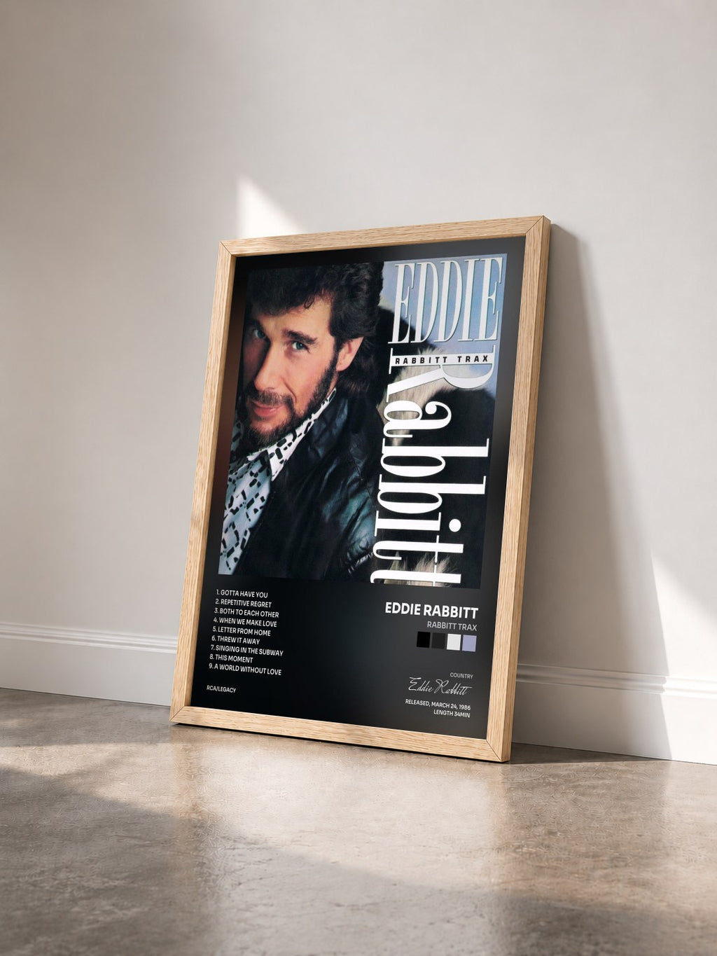 #bois Tableau de l'album Rabbitt Trax de Eddie Rabbitt vu de trois quarts, cadre en bois brut