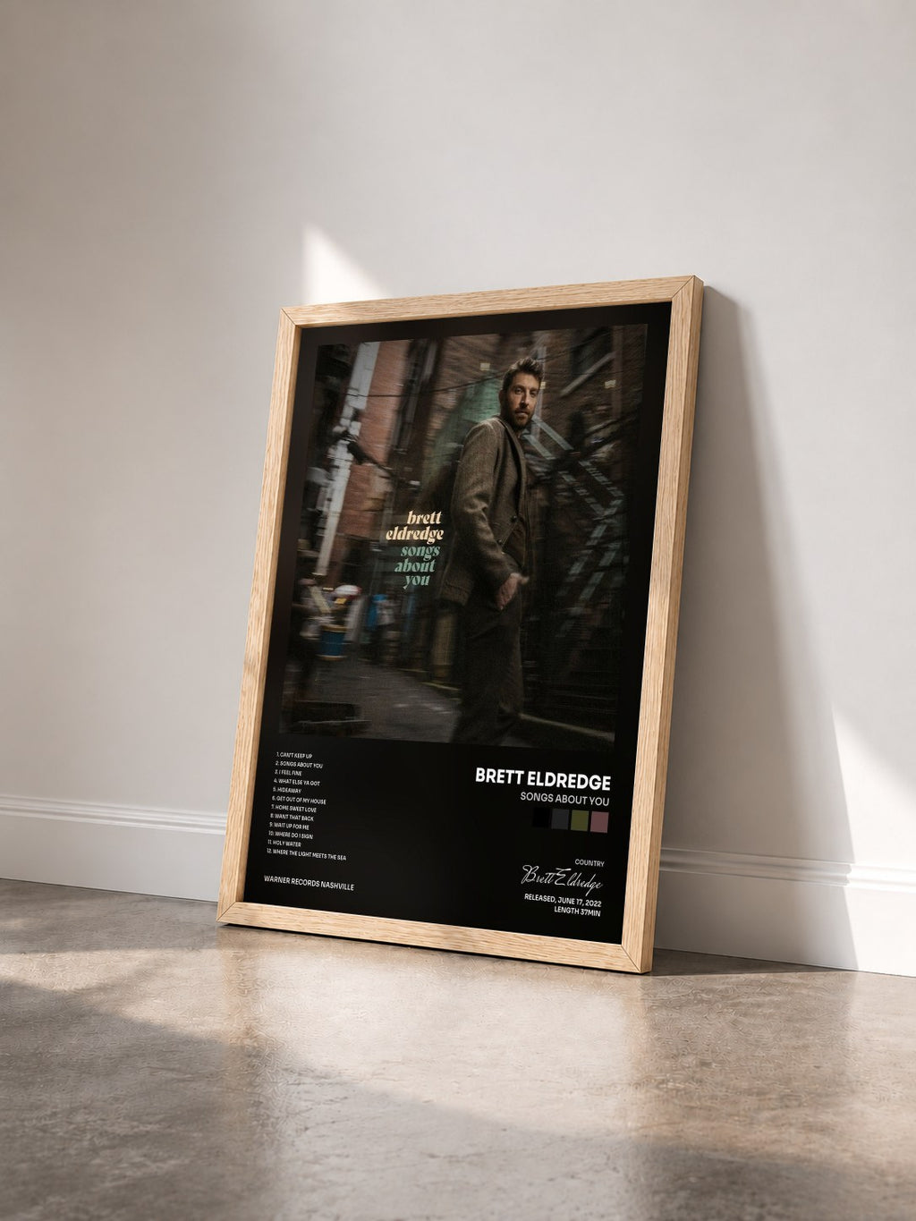 #bois Tableau de l'album Songs About You de Brett Eldredge vu de trois quarts, cadre en bois brut