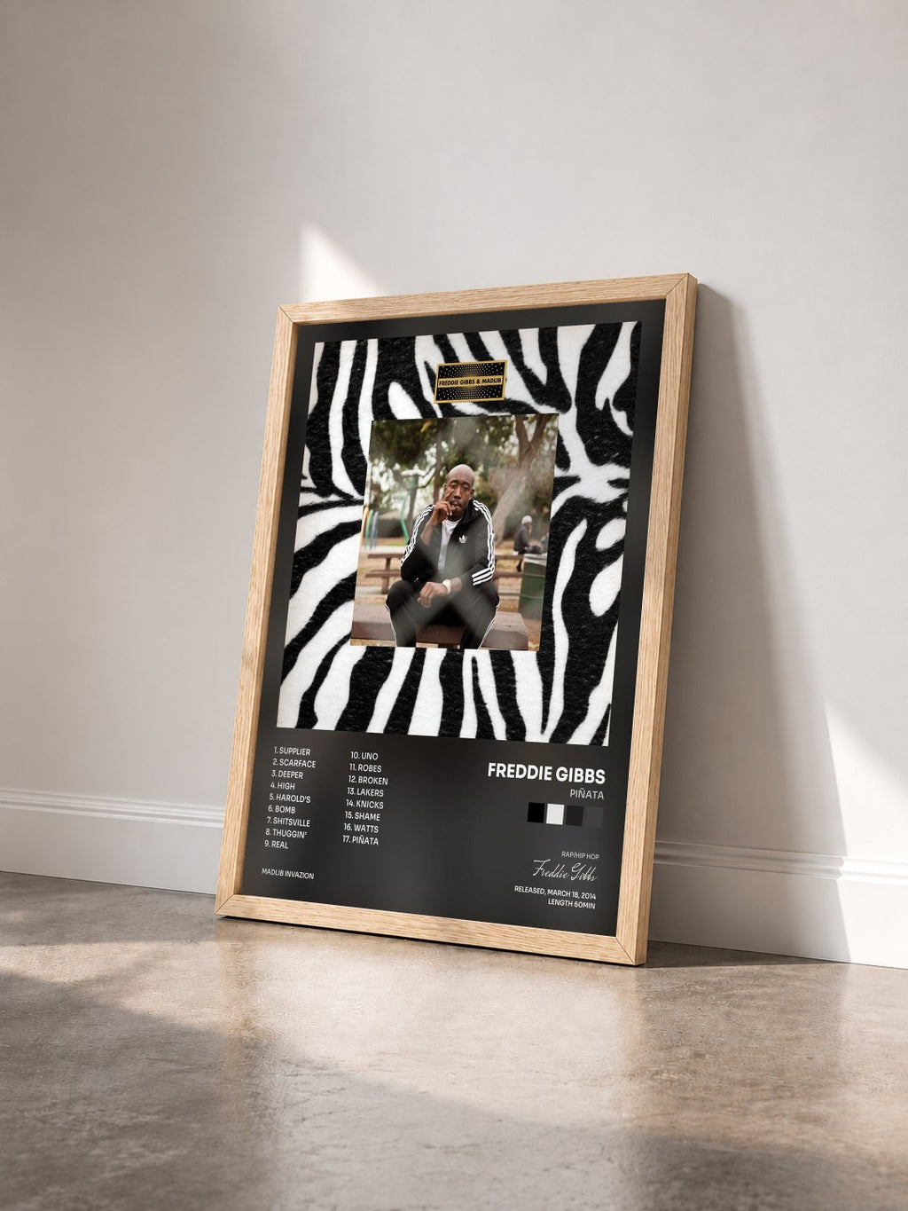 #bois Tableau de l'album Piñata de Freddie Gibbs vu de trois quarts, cadre en bois brut