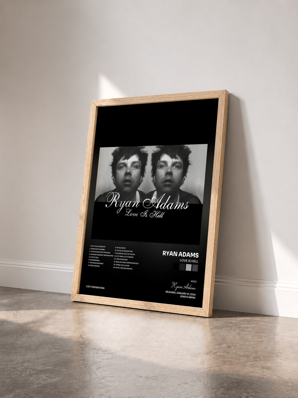 #bois Tableau de l'album Love Is Hell de Ryan Adams vu de trois quarts, cadre en bois brut