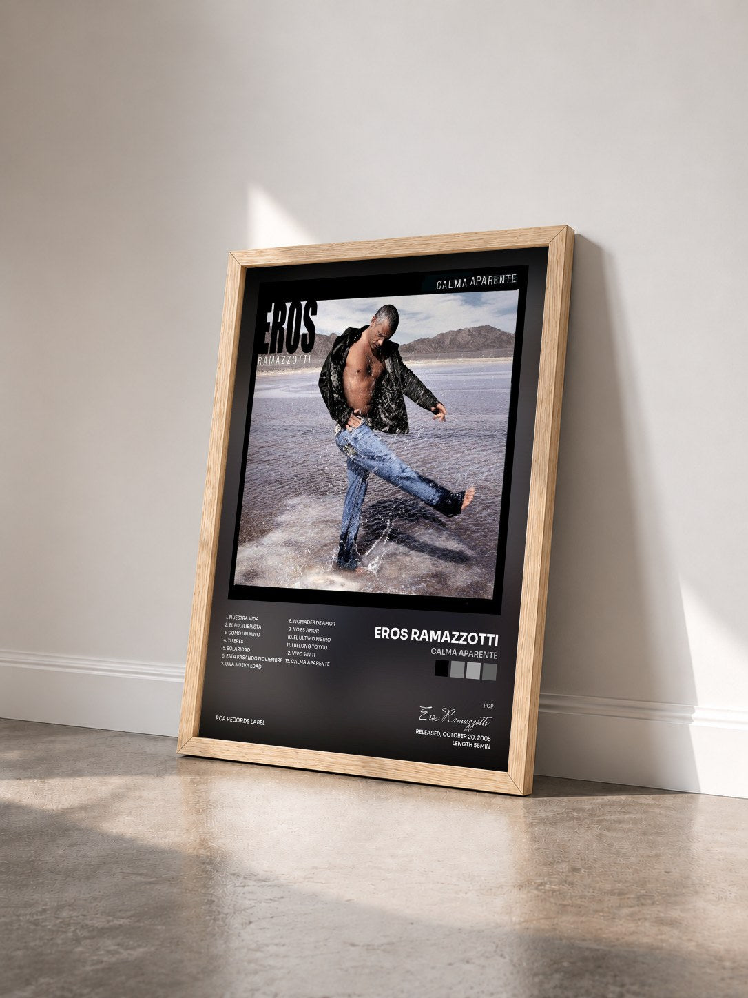 #bois Tableau de l'album Calma Aparente de Eros Ramazzotti vu de trois quarts, cadre en bois brut