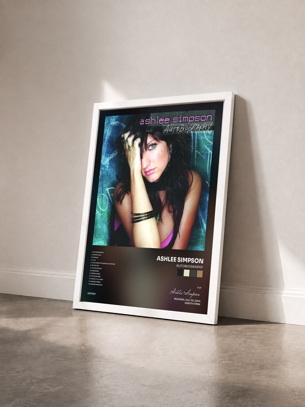 #blanc Tableau de l'album Autobiography de Ashlee Simpson vu de trois quarts, cadre blanc
