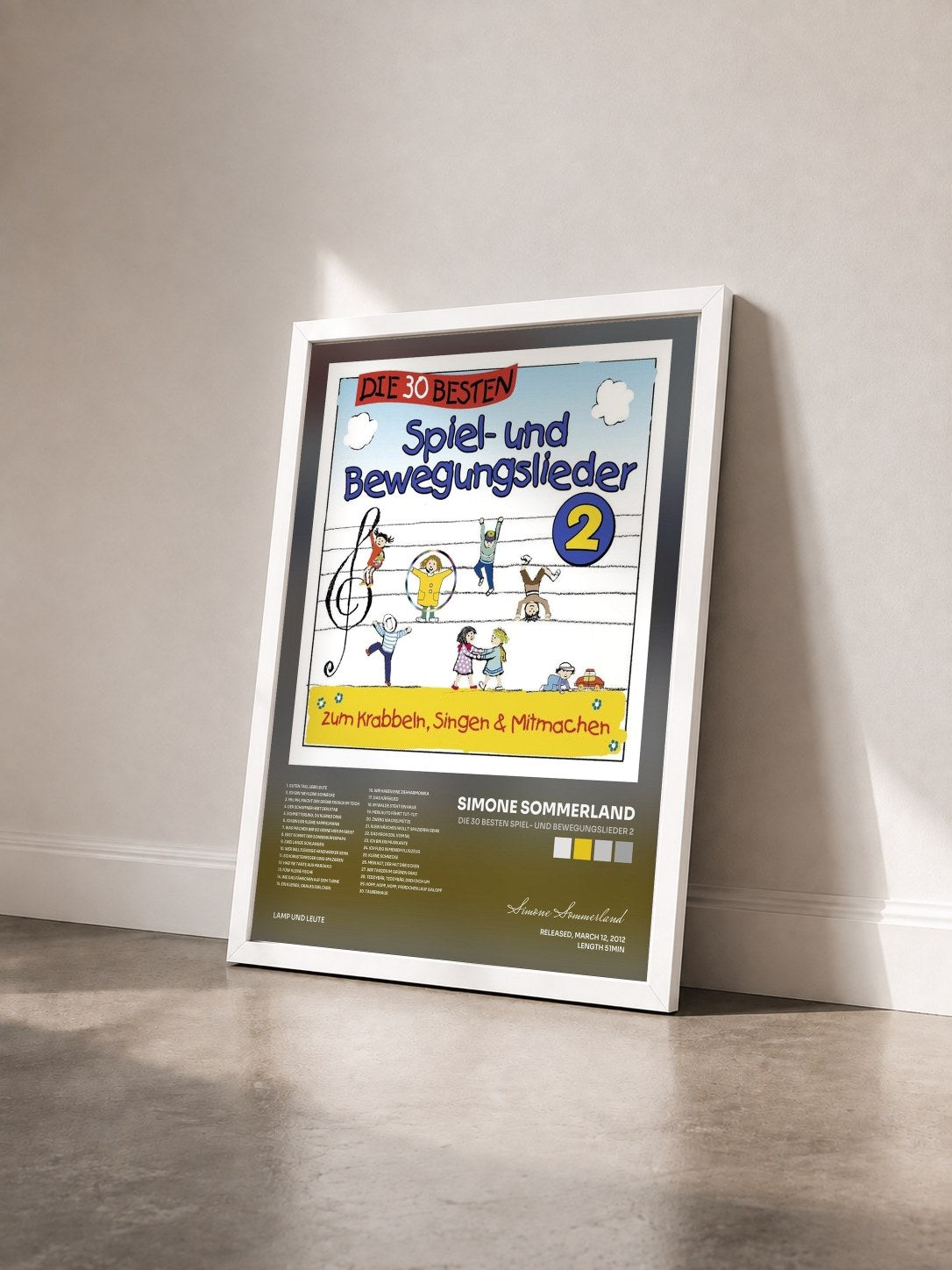 #blanc Tableau de l'album Die 30 besten Spiel- und Bewegungslieder 2 de Simone Sommerland vu de trois quarts, cadre blanc
