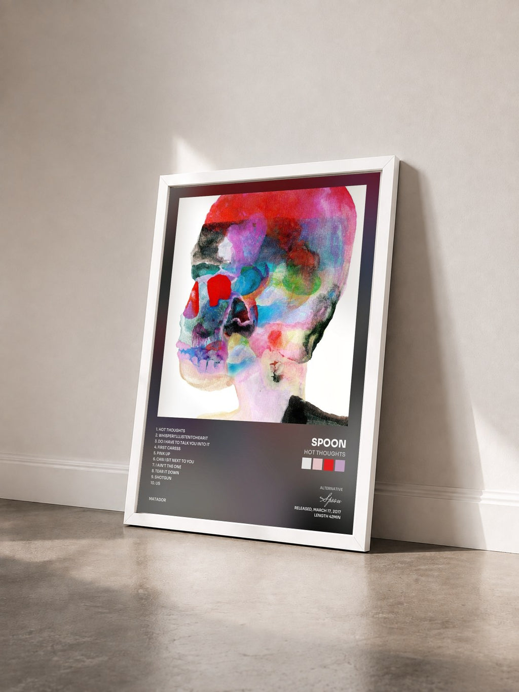 #blanc Tableau de l'album Hot Thoughts de Spoon vu de trois quarts, cadre blanc