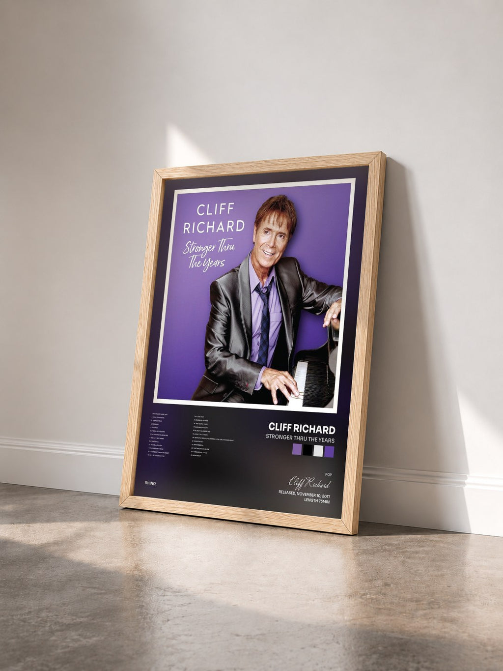 #bois Tableau de l'album Stronger Thru the Years de Cliff Richard vu de trois quarts, cadre en bois brut