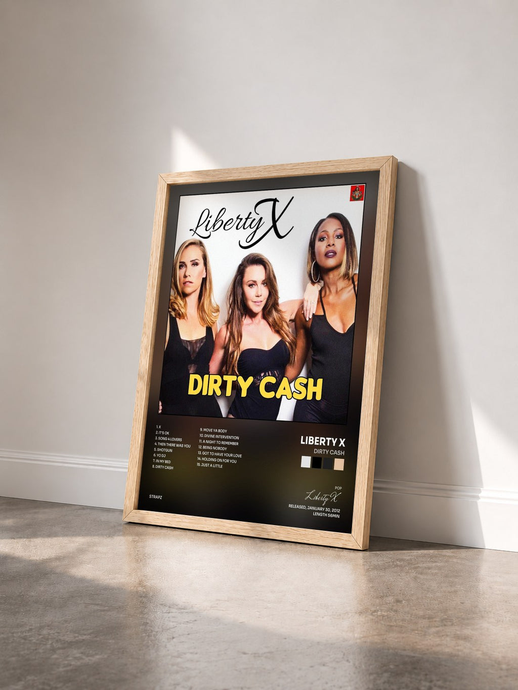 #bois Tableau de l'album Dirty Cash de Liberty X vu de trois quarts, cadre en bois brut