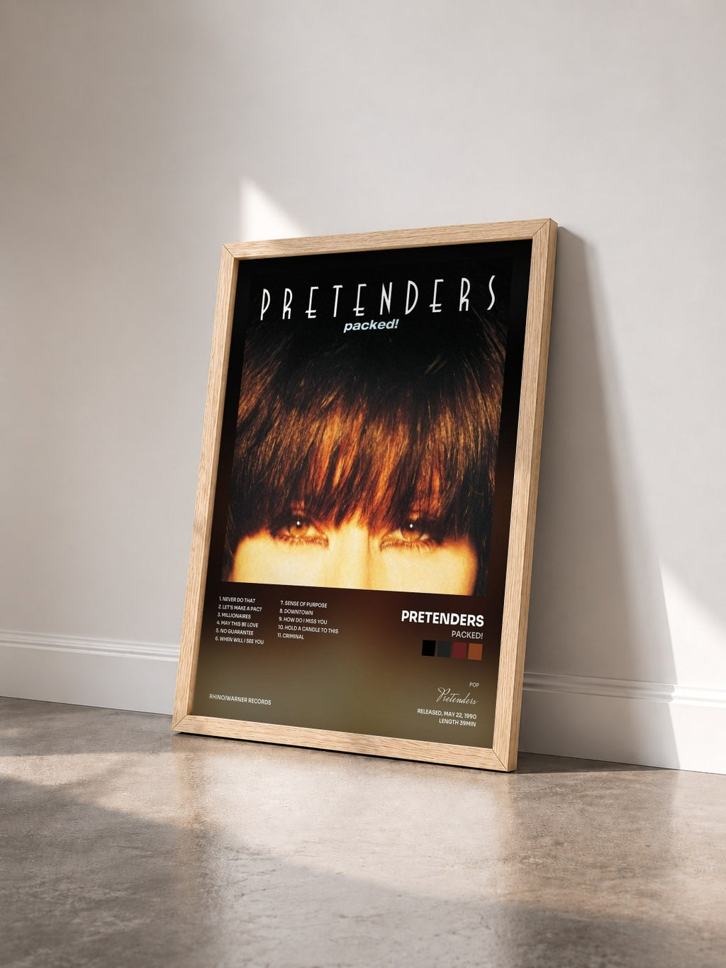#bois Tableau de l'album Packed! de Pretenders vu de trois quarts, cadre en bois brut