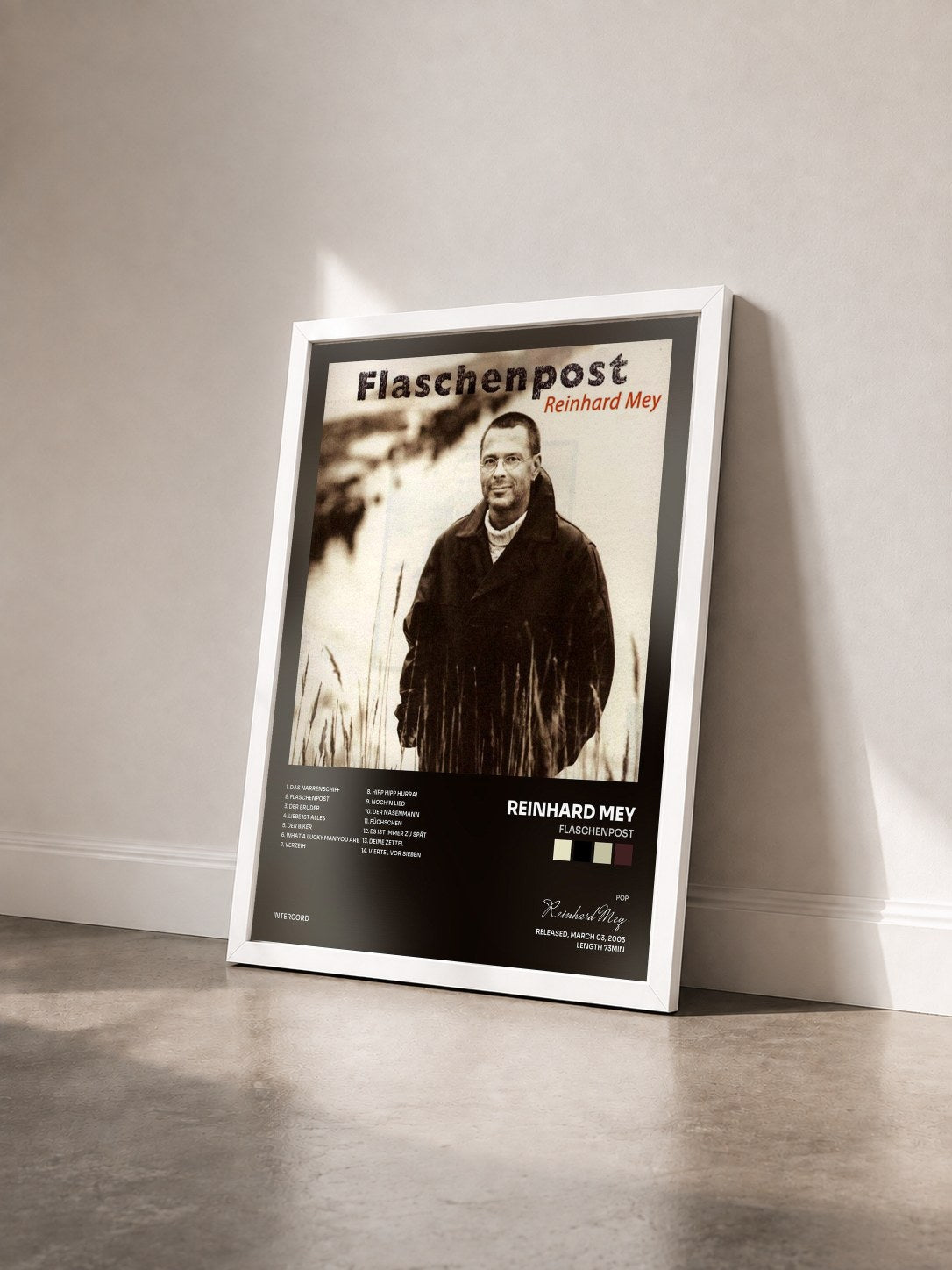 #blanc Tableau de l'album Flaschenpost de Reinhard Mey vu de trois quarts, cadre blanc