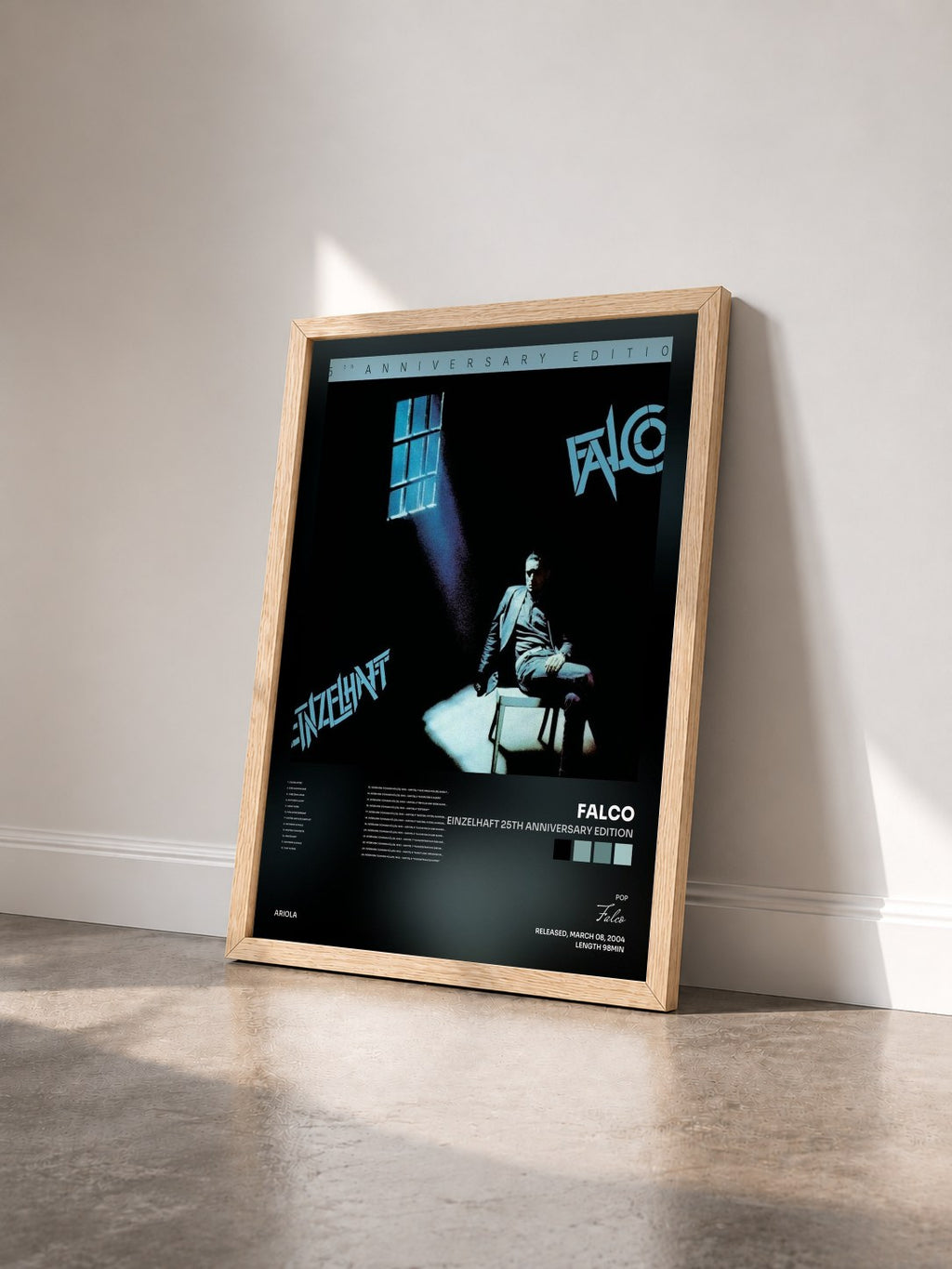 #bois Tableau de l'album Einzelhaft 25th Anniversary Edition de Falco vu de trois quarts, cadre en bois brut