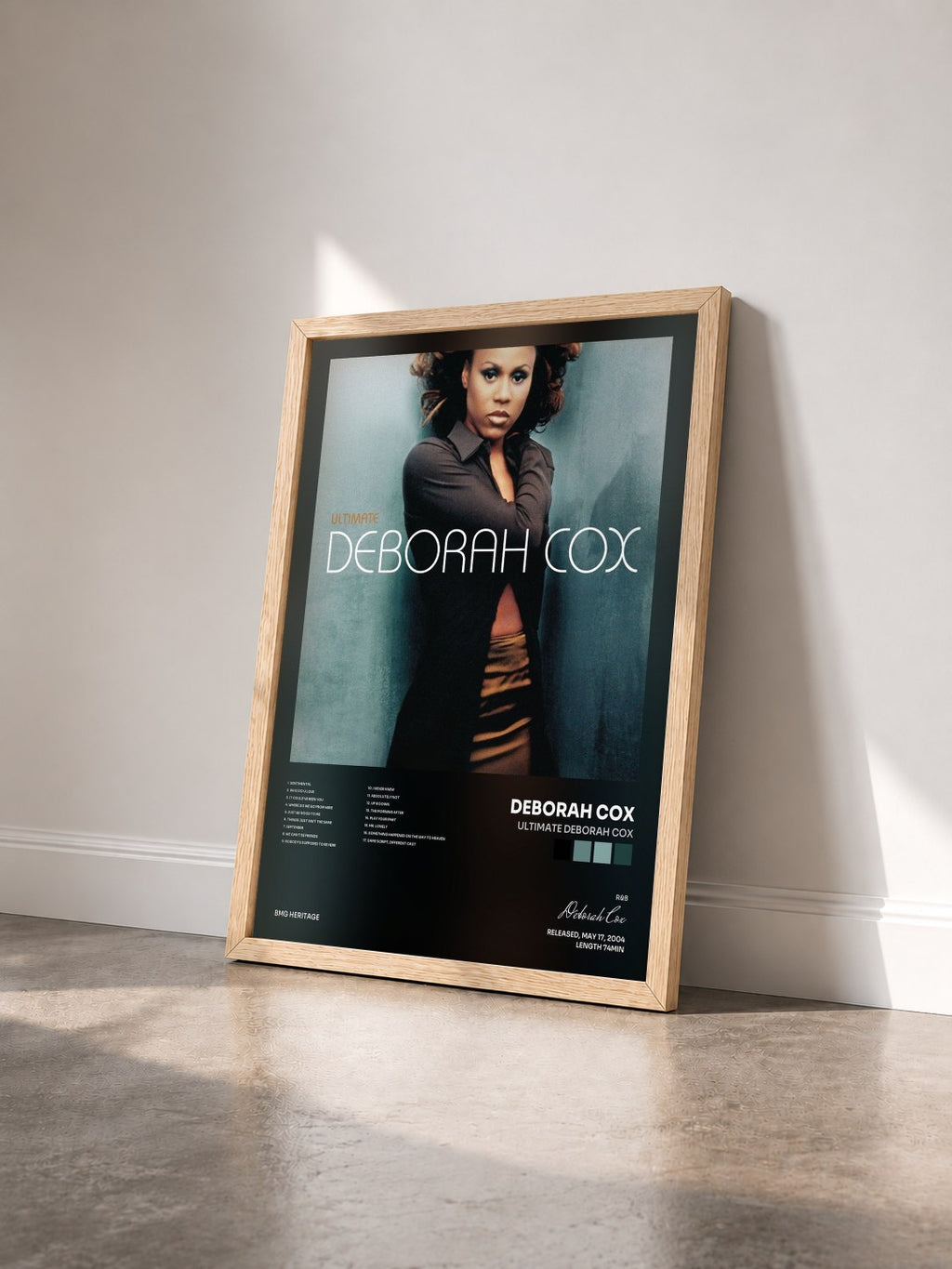 #bois Tableau de l'album Ultimate Deborah Cox de Deborah Cox vu de trois quarts, cadre en bois brut