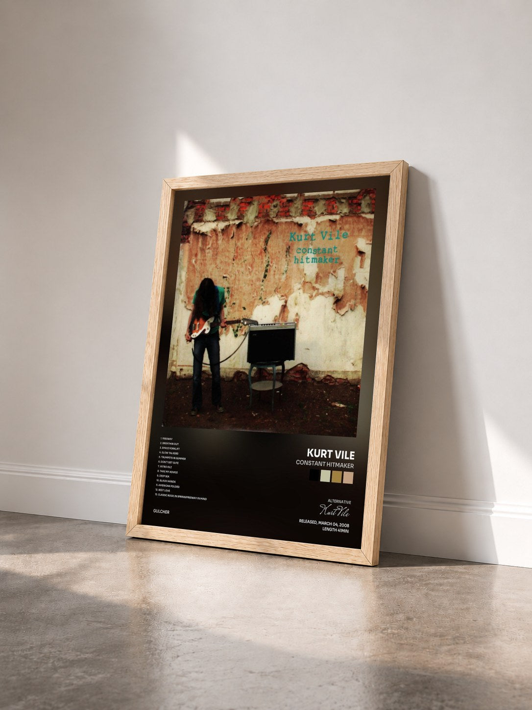 #bois Tableau de l'album Constant Hitmaker de Kurt Vile vu de trois quarts, cadre en bois brut