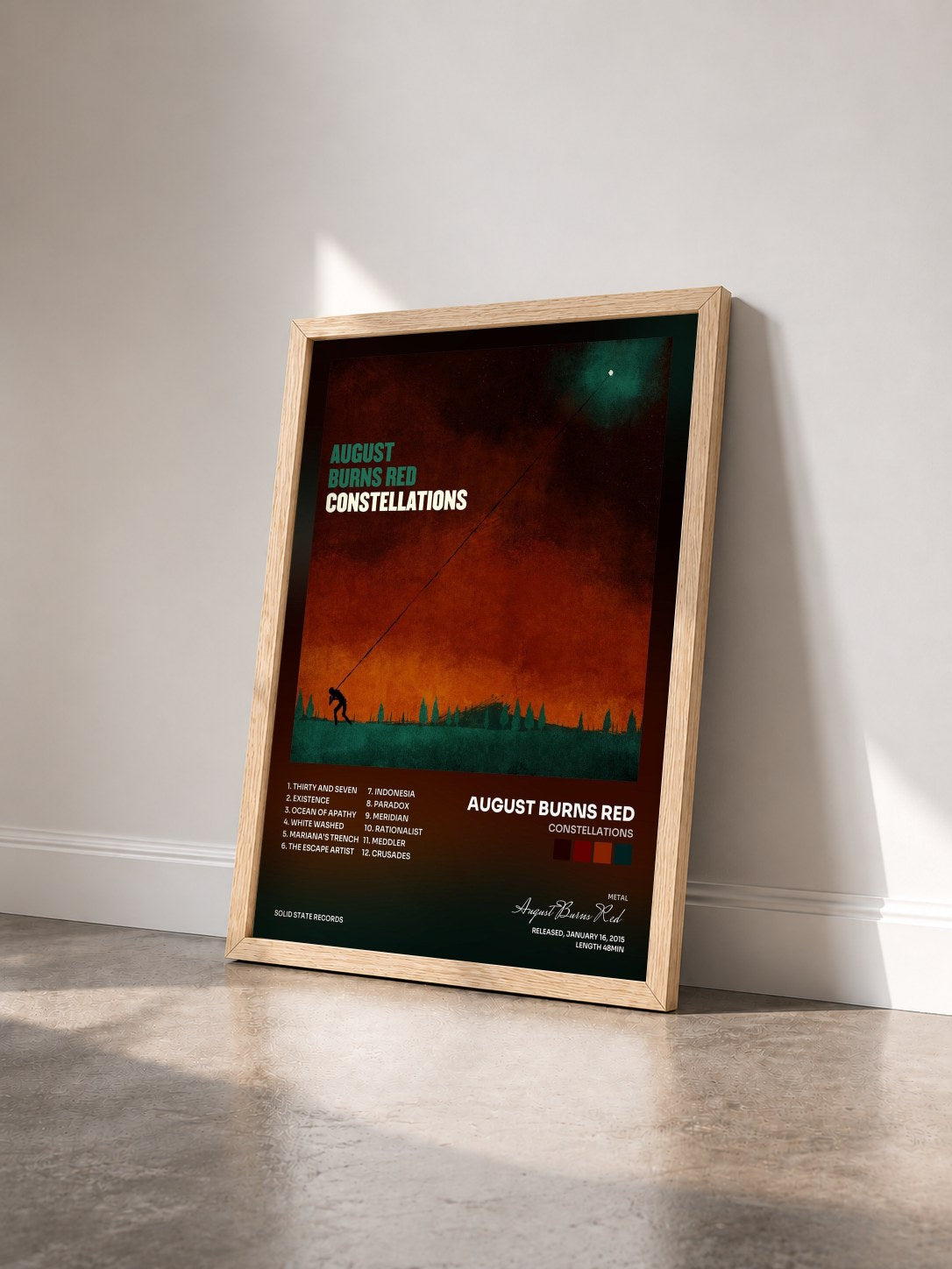#bois Tableau de l'album Constellations de August Burns Red vu de trois quarts, cadre en bois brut