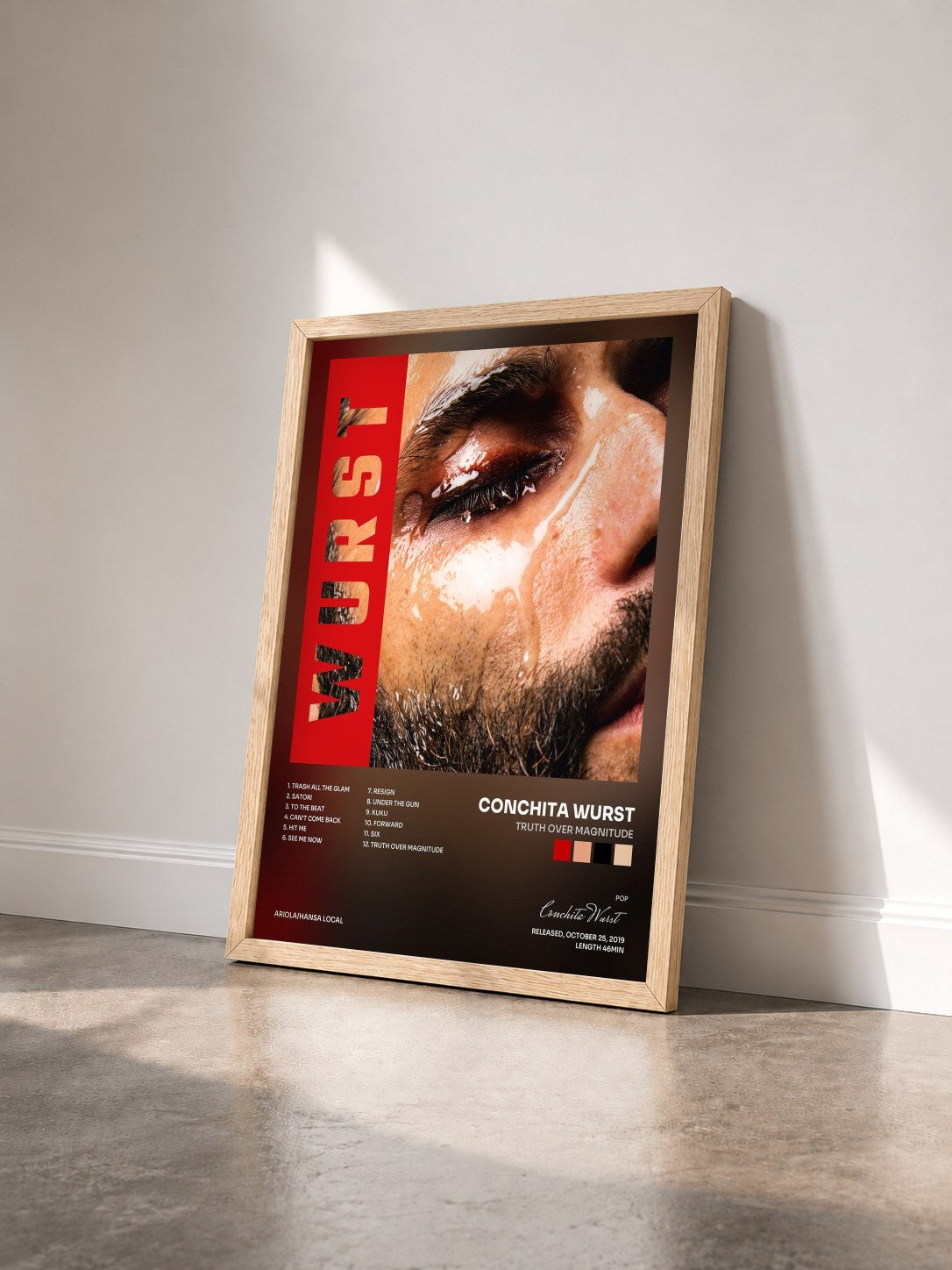 #bois Tableau de l'album Truth Over Magnitude de Conchita Wurst vu de trois quarts, cadre en bois brut